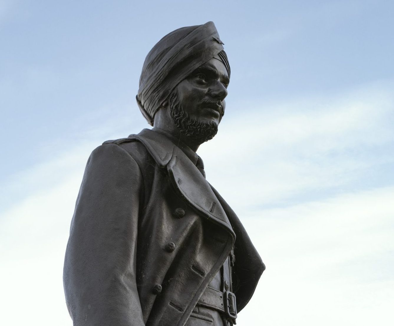 Pujji sculpture against a blue sky