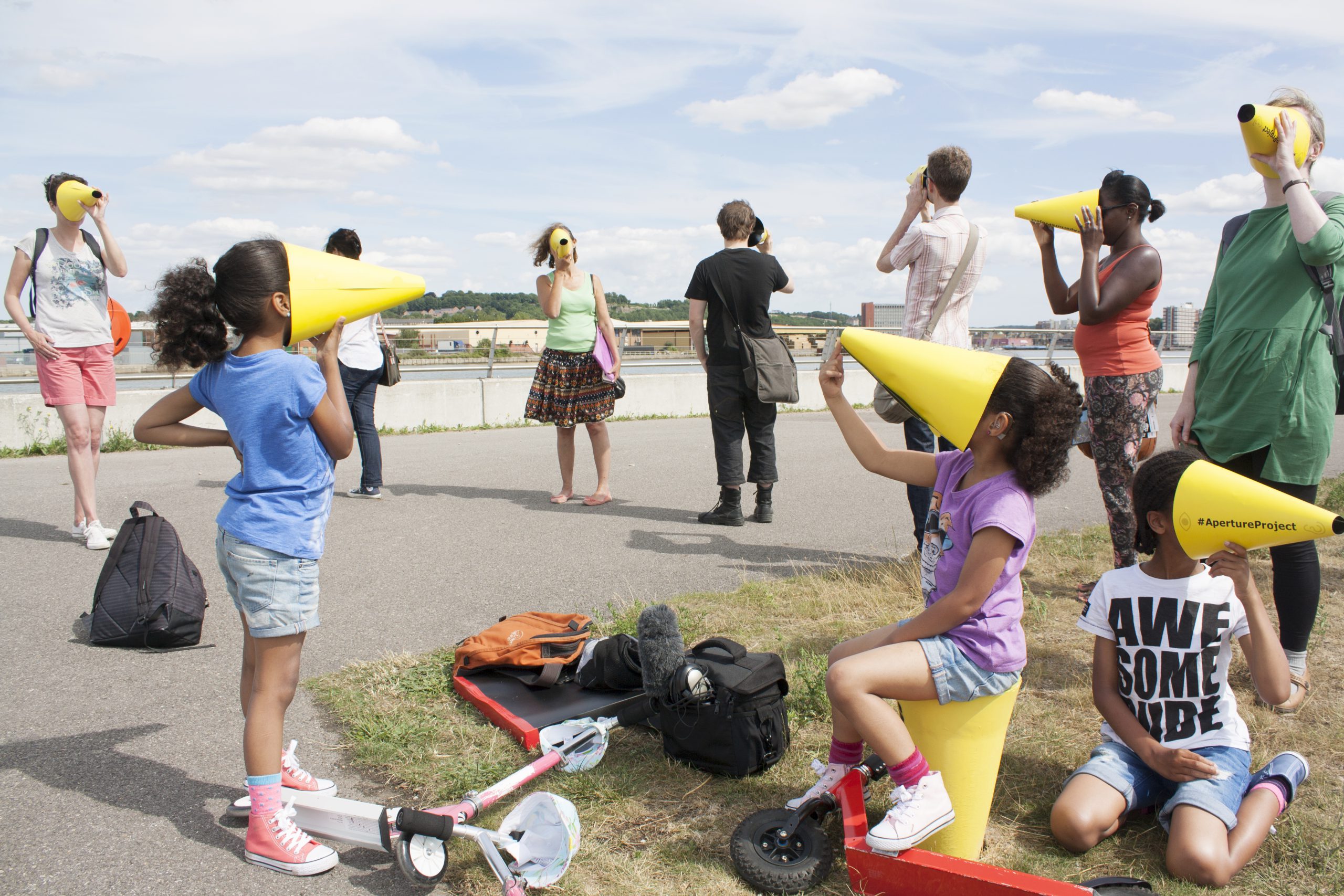 Children with yellow cones on their faces