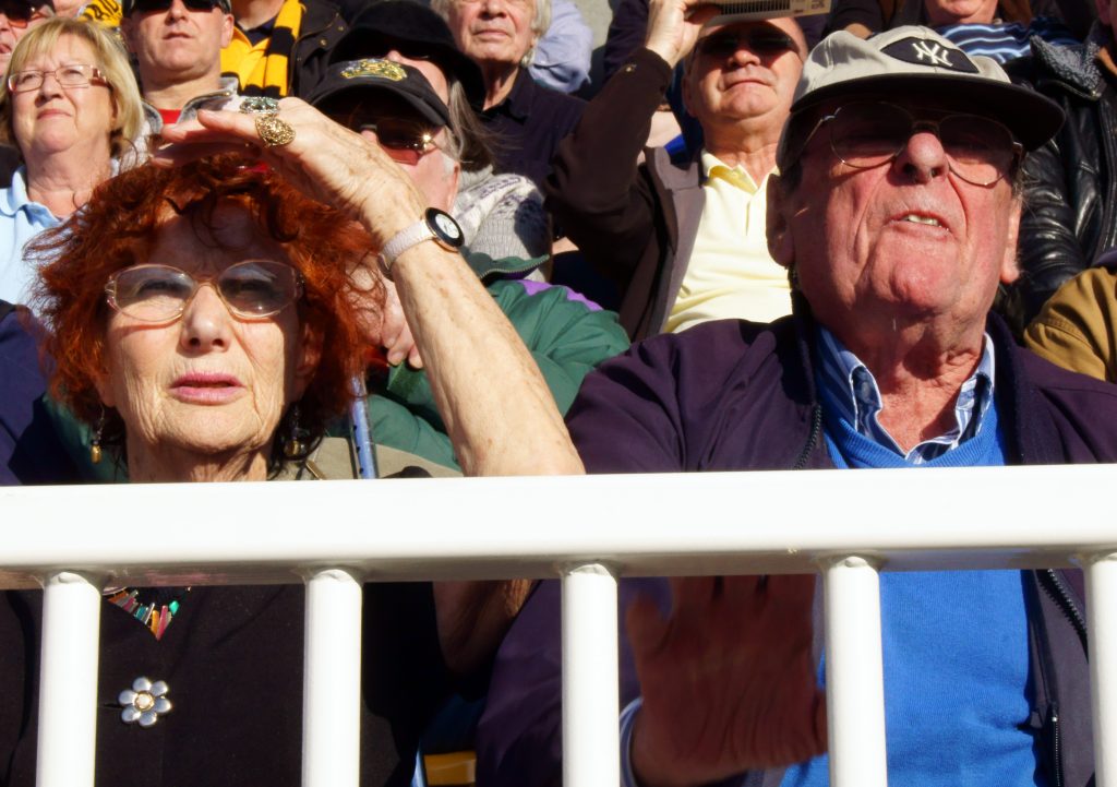 football fans watching football match